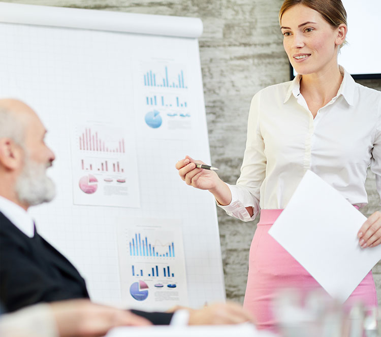 Female and male business executives talking together